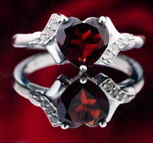A ruby heart-shaped ring